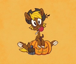 Size: 1994x1684 | Tagged: safe, artist:jimmyjamno1, oc, oc only, oc:acres, earth pony, pony, blonde, blonde mane, blonde tail, brown coat, candy, coat markings, cowboy hat, earth pony oc, food, jack-o-lantern, lollipop, looking at you, male, mouth hold, pumpkin, saddle bag, simple background, sitting, smiling, solo, stallion, underhoof, unshorn fetlocks, yellow background