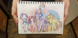 Size: 1280x623 | Tagged: safe, artist:unknownfilters, derpibooru import, applejack, fluttershy, pinkie pie, rainbow dash, rarity, twilight sparkle, twilight sparkle (alicorn), alicorn, earth pony, pegasus, pony, unicorn, irl, mane six, photo, traditional art