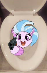 Size: 1181x1823 | Tagged: safe, artist:cadillacdynamite, derpibooru import, silverstream, pony, seapony (g4), cute, delet this, diastreamies, gun, irl, looking at you, open mouth, photo, ponies in real life, solo, toilet, weapon