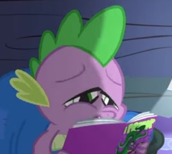 Size: 572x513 | Tagged: safe, derpibooru import, screencap, spike, dragon, power ponies (episode), comic book, cropped, implied mane-iac, power ponies, reading, solo