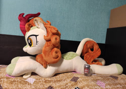 Size: 1498x1060 | Tagged: safe, artist:gingerale2016, derpibooru import, autumn blaze, kirin, can, dr. pepper, irl, lying down, photo, plushie, prone, solo