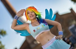 Size: 1080x709 | Tagged: safe, derpibooru import, rainbow dash, human, belly button, clothes, cosplay, costume, hand on hip, irl, irl human, photo, salute