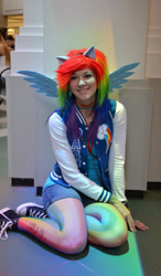 Size: 561x960 | Tagged: safe, artist:glitzygeekgirl, derpibooru import, rainbow dash, human, 2012, animecon, choker, clothes, converse, cosplay, costume, fishnet stockings, irl, irl human, multicolored hair, photo, rainbow hair, shoes, shorts, sneakers, tattoo