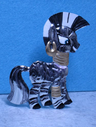 Size: 823x1097 | Tagged: safe, alternate version, artist:malte279, derpibooru import, part of a set, zecora, zebra, craft, embossing, irl, metal foil, photo, relief