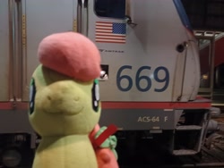 Size: 4000x3000 | Tagged: safe, artist:topsangtheman, derpibooru import, peachy sweet, earth pony, pony, amtrak, apple family member, irl, looking at you, photo, plushie, solo, train