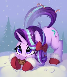 Size: 2026x2324 | Tagged: safe, artist:taneysha, derpibooru import, starlight glimmer, pony, unicorn, booties, candy, candy cane, cheek fluff, christmas, cookie, cute, ear fluff, ears, face down ass up, female, food, glimmerbetes, high res, holiday, mare, mouth hold, smiling, snow, snowfall, solo, winter