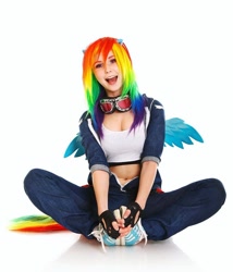 Size: 1080x1260 | Tagged: safe, artist:natsumipon, derpibooru import, rainbow dash, human, belly button, clothes, cosplay, costume, irl, irl human, open mouth, open smile, photo, shoes, simple background, sitting, smiling, sneakers, white background