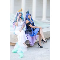 Size: 1080x1080 | Tagged: safe, derpibooru import, princess celestia, princess luna, human, clothes, cosplay, costume, crossed legs, duo, high heels, irl, irl human, photo, royal sisters, shoes, siblings, sisters, sitting