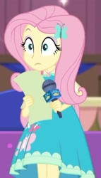 Size: 960x1683 | Tagged: safe, derpibooru import, screencap, fluttershy, better together, equestria girls, beautiful, clothes, cute, cutie mark, cutie mark on clothes, dress, dress interior, geode of fauna, magical geodes, microphone, nervous, script, shyabetes