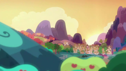 Size: 1280x720 | Tagged: safe, derpibooru import, screencap, the perfect pear, apple, apple tree, background, cloud, hill, mountain, no pony, ponyville, scenic ponyville, sunset, tree, windmill