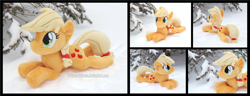 Size: 4545x1754 | Tagged: safe, artist:peruserofpieces, derpibooru import, applejack, earth pony, pony, beanie (plushie), female, happy, irl, looking at you, lying down, mare, photo, plushie, prone, smiling, snow, sploot, tree