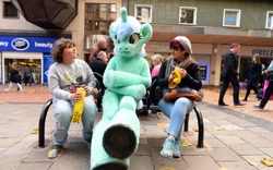 Size: 800x498 | Tagged: safe, derpibooru import, lyra heartstrings, bench, birmingham, fursuit, irl, photo, ponysuit, united kingdom