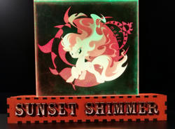 Size: 2805x2065 | Tagged: safe, artist:themisto97, derpibooru import, sunset shimmer, pony, unicorn, acrylic plastic, acrylight, catasterism, craft, engraving, evil grin, female, fiery shimmer, fire, fire tail, fireball, grin, lasercut, led, mane of fire, mare, multicolored, nightlight, photo, raised hoof, raised leg, rapidash shimmer, smiling, smirk, solo, sun, text