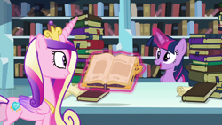 Size: 1280x720 | Tagged: safe, derpibooru import, screencap, princess cadance, twilight sparkle, twilight sparkle (alicorn), alicorn, pony, the crystalling, book, bookshelf, crown, crystal empire, duo, duo female, female, glowing horn, horn, jewelry, library, magic, magic aura, mare, open mouth, regalia, sisters-in-law, telekinesis