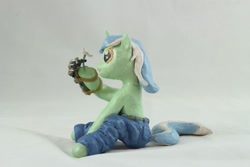 Size: 1280x854 | Tagged: safe, artist:azgchip, derpibooru import, lyra heartstrings, pony, unicorn, background pony, clothes, craft, female, flower, hand, jeans, mare, mechanical hands, pants, photo, sculpture, sitting, solo, that pony sure does love hands, that pony sure does love humans, wax