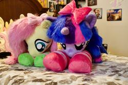 Size: 1800x1200 | Tagged: safe, artist:fluttershyhiker, artist:qtpony, derpibooru import, fluttershy, pony, clothes, irl, lying down, photo, plushie, prone, socks, striped socks