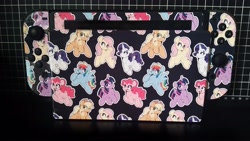 Size: 4096x2304 | Tagged: safe, artist:partylikeanartist, derpibooru import, applejack, fluttershy, pinkie pie, rainbow dash, rarity, twilight sparkle, twilight sparkle (alicorn), alicorn, earth pony, pegasus, pony, unicorn, console, merchandise, nintendo, nintendo switch, photo