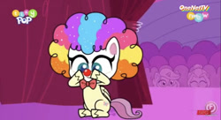 Size: 828x452 | Tagged: safe, derpibooru import, screencap, pegasus, pony, lolly-pop, my little pony: pony life, spoiler:pony life, spoiler:pony life s02e19, bowtie, clown, clown makeup, clown nose, clown wig, female, flutterclown, logo, sitting, solo, tiny pop