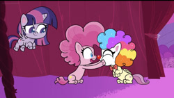 Size: 828x467 | Tagged: safe, derpibooru import, screencap, fluttershy, pinkie pie, twilight sparkle, twilight sparkle (alicorn), alicorn, earth pony, pegasus, pony, lolly-pop, my little pony: pony life, spoiler:pony life s02e19, chubby cheeks, clown, clown makeup, clown nose, clown wig, curtains, female, flutterclown, flying, holding a pony, sitting, squished face, trio, trio female