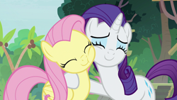 Size: 1920x1080 | Tagged: safe, derpibooru import, screencap, fluttershy, rarity, pegasus, pony, unicorn, fake it 'til you make it, cheek squish, duo, eyes closed, female, mare, smiling, squishy cheeks