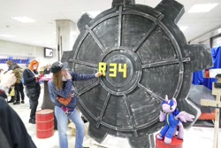 Size: 1600x1067 | Tagged: safe, derpibooru import, twilight sparkle, human, fallout equestria, 2021, cyrillic, irl, irl human, newbronycon, photo, plushie, rubronycon, rule 34, russian, vault door