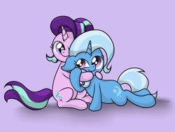 Size: 3368x2540 | Tagged: safe, artist:background basset, derpibooru import, starlight glimmer, trixie, pony, unicorn, blushing, duo, duo female, female, high res, holding hooves, hug, lesbian, lying down, mare, shipping, simple background, startrix