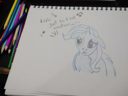 Size: 1280x960 | Tagged: safe, artist:dougtheloremaster, derpibooru import, trixie, pony, unicorn, don't stop believing, ears, floppy ears, journey, pencil, pencil drawing, photo, sad, singing, sketchpad, song reference, traditional art