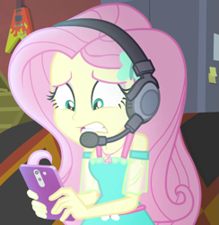 Size: 717x734 | Tagged: safe, derpibooru import, screencap, fluttershy, better together, costume conundrum, equestria girls, cellphone, cropped, gritted teeth, headphones, headset, phone, solo