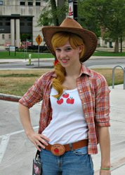 Size: 571x800 | Tagged: safe, artist:atemismooncosplay, derpibooru import, applejack, human, clothes, cosplay, costume, cowboy hat, freckles, hand on hip, hat, irl, irl human, photo, smiling