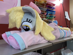 Size: 2688x2016 | Tagged: safe, artist:qtpony, derpibooru import, derpy hooves, pony, clothes, irl, lying down, photo, plushie, prone, shirt, solo