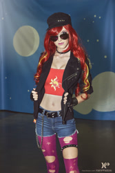Size: 1365x2048 | Tagged: safe, derpibooru import, sunset shimmer, human, belly button, bronycon, bronycon 2015, clothes, cosplay, costume, fingerless gloves, gloves, irl, irl human, photo, sunglasses
