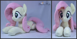 Size: 3839x1949 | Tagged: safe, artist:shunnkai, derpibooru import, fluttershy, pony, irl, lying down, photo, plushie, prone, solo