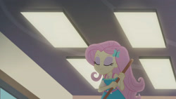 Size: 3410x1920 | Tagged: safe, derpibooru import, screencap, fluttershy, better together, equestria girls, so much more to me, broom, eyes closed, female, geode of fauna, hairpin, jewelry, magical geodes, necklace, smiling, solo