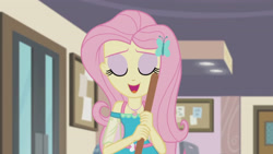 Size: 3410x1920 | Tagged: safe, derpibooru import, screencap, fluttershy, better together, equestria girls, so much more to me, broom, eyes closed, female, geode of fauna, hairpin, jewelry, magical geodes, necklace, open mouth, smiling, solo