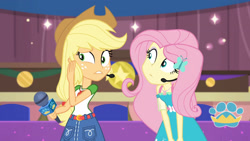 Size: 3410x1920 | Tagged: safe, derpibooru import, screencap, applejack, fluttershy, best in show: the victory lap, better together, equestria girls, applejack's hat, belt, best in show logo, clothes, cowboy hat, cutie mark, cutie mark on clothes, denim skirt, duo, duo female, female, frown, geode of fauna, geode of super strength, gritted teeth, hairpin, hat, high res, jewelry, magical geodes, microphone, necklace, skirt