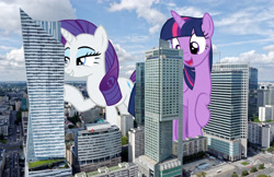 Size: 2700x1750 | Tagged: safe, artist:andoanimalia, artist:theotterpony, derpibooru import, rarity, twilight sparkle, twilight sparkle (alicorn), alicorn, pony, unicorn, female, giant pony, giantess, highrise ponies, irl, macro, mare, photo, poland, ponies in real life, story included, warsaw