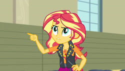 Size: 3410x1920 | Tagged: safe, derpibooru import, screencap, sunset shimmer, equestria girls, equestria girls series, rarity investigates: the case of the bedazzled boot, clothes, cutie mark, cutie mark on clothes, female, frown, geode of empathy, gritted teeth, hand on hip, high res, jacket, jewelry, leather, leather jacket, magical geodes, necklace, pointing, solo