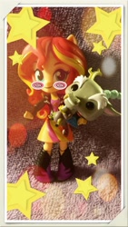 Size: 540x960 | Tagged: safe, derpibooru import, discord, sunset shimmer, equestria girls, black sclera, boots, chibi, clothes, doll, dress, equestria girls minis, eqventures of the minis, irl photo, jacket, leather jacket, shoes, stars, swirls, toy