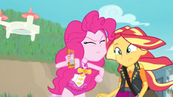 Size: 3410x1920 | Tagged: safe, derpibooru import, screencap, pinkie pie, sunset shimmer, better together, equestria girls, forgotten friendship, cellphone, clothes, cutie mark, cutie mark on clothes, drone, duo, duo female, eyes closed, female, geode of empathy, geode of sugar bombs, high res, jacket, jewelry, leather, leather jacket, magical geodes, necklace, one-piece swimsuit, phone, pinkie pie swimsuit, purse, sleeveless, smartphone, swimsuit, yelling