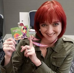 Size: 1080x1070 | Tagged: safe, derpibooru import, oc, oc:golden gates, human, babscon, babscon 2016, babscon mascots, badge, con badge, irl, irl human, lauren faust, looking at you, photo, smiling, smiling at you