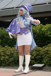 Size: 2592x3888 | Tagged: safe, artist:mieucosplay, derpibooru import, trixie, human, boots, bronycon, bronycon 2014, cape, clothes, cosplay, costume, fishnet stockings, gloves, hat, high heel boots, irl, irl human, photo, shoes, skirt, top hat, trixie's cape, vest