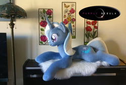 Size: 976x658 | Tagged: safe, artist:purplenebulastudios, derpibooru import, trixie, pony, irl, life size, lying down, photo, plushie, prone, solo