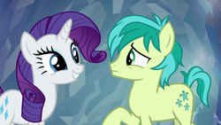 Size: 1920x1080 | Tagged: safe, derpibooru import, screencap, rarity, sandbar, earth pony, pony, unicorn, season 8, what lies beneath, spoiler:s08, duo, female, frown, grin, looking at each other, male, mare, raised hoof, raised leg, smiling, teenager