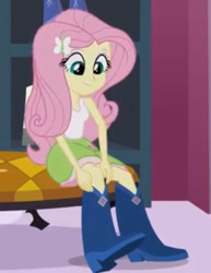 Size: 439x569 | Tagged: safe, derpibooru import, screencap, fluttershy, equestria girls, equestria girls (movie), boots, carousel boutique, clothes, shoes, sleeveless, solo, tanktop