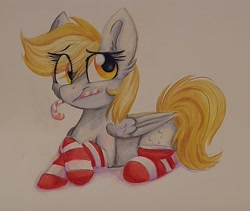 Size: 1866x1578 | Tagged: safe, artist:littleblackraencloud, derpibooru import, derpy hooves, pegasus, pony, candy, candy cane, clothes, food, lying down, prone, socks, solo, striped socks, traditional art