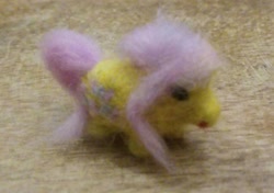 Size: 1137x799 | Tagged: safe, artist:dogisaga, derpibooru import, fluttershy, earth pony, pony, cutie mark, earth pony fluttershy, female, irl, needle felted, photo, plushie, race swap, smol, solo