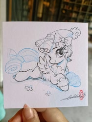 Size: 1536x2048 | Tagged: safe, artist:paipaishuaige, derpibooru import, cozy glow, pegasus, pony, bow, looking at you, lying down, photo, sketch, smiling, solo, traditional art