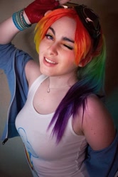 Size: 716x1080 | Tagged: safe, derpibooru import, rainbow dash, human, bracelet, clothes, cosplay, costume, cutie mark on clothes, goggles, irl, irl human, jewelry, looking at you, multicolored hair, one eye closed, photo, rainbow hair, tanktop, wink, winking at you