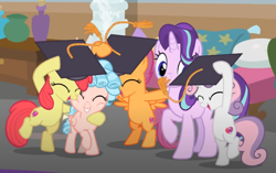 Size: 1097x689 | Tagged: safe, derpibooru import, screencap, apple bloom, cozy glow, scootaloo, starlight glimmer, sweetie belle, pony, marks for effort, bipedal, cropped, cutie mark crusaders, eyes closed, graduation cap, hat, smiling, solo