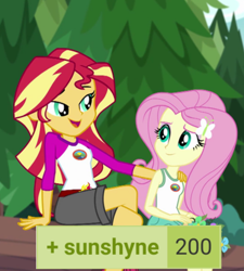 Size: 720x801 | Tagged: safe, derpibooru import, edit, edited screencap, screencap, fluttershy, sunset shimmer, equestria girls, legend of everfree, derpibooru, duo, duo female, female, lesbian, looking at each other, looking at someone, meta, milestone, png, shipping, sitting, sunshyne, tags